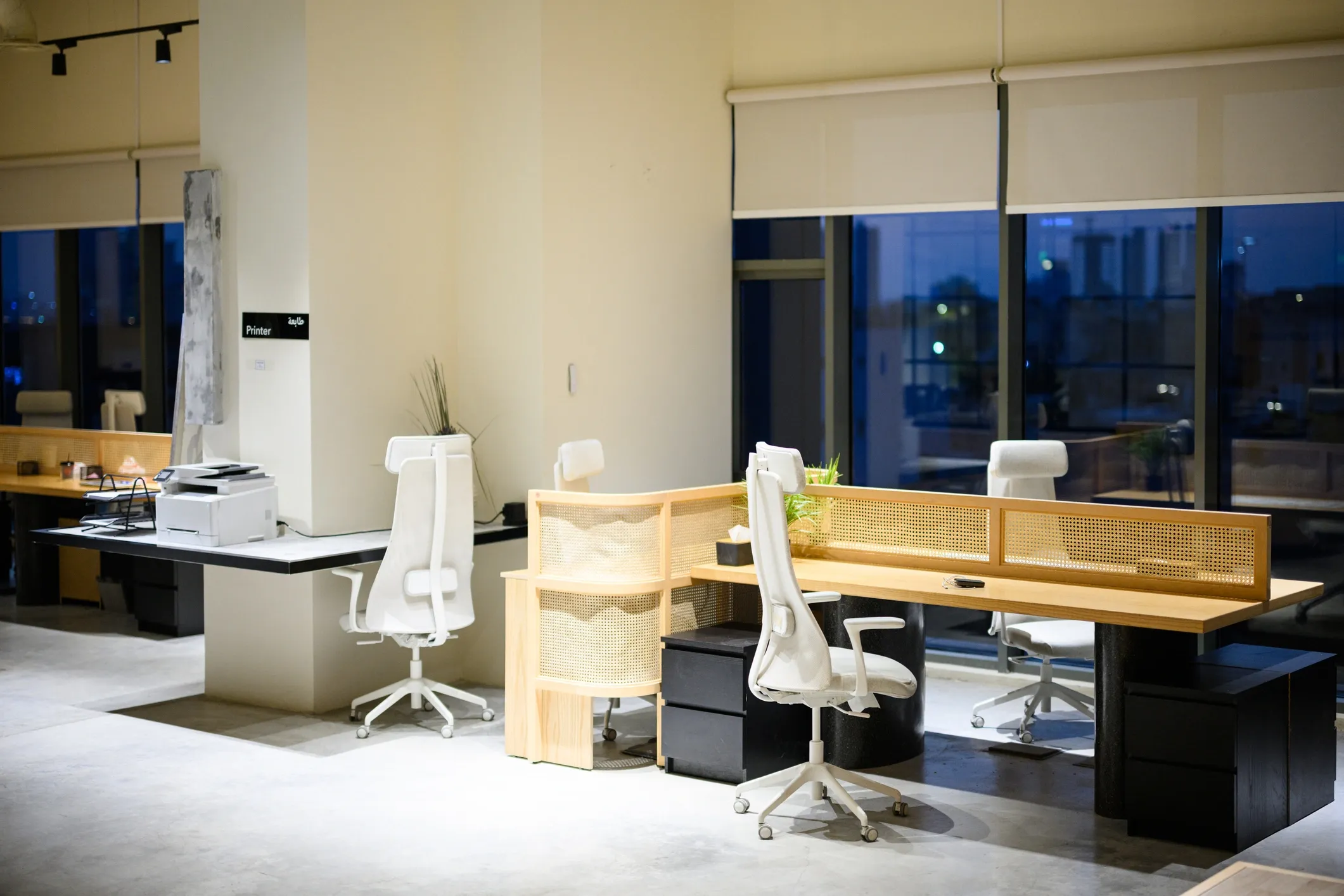 Open-plan office with wooden desks